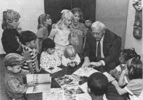 George H. Ryan reads to a group of Illinois schoolchildren