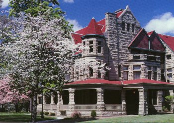 The Newcomb-Stillwell Mansion, built in 1891, is listed on the National Register of Historic Places. The Romanesque Revival style building is now home to the Quincy Museum of Natural History and Art