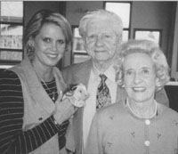 John Erickson, DVM (center), with daughter, Patricia Atkins (left) and wife, Evelyn Erickson