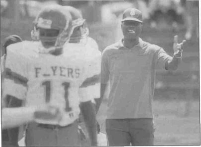 Coach Shannon directing his players