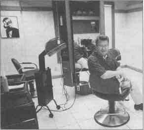 Bernie Koch of Springfield uses his salon...