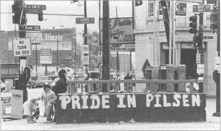 As the Latino population has skyrocekted in Chicago neighborhoods like Pilsen, residents have tried to keep gang graffiti to a minimum.  Brightlyy painted murals and signs are a common sight in these communities, often adorning storefronts and residences.