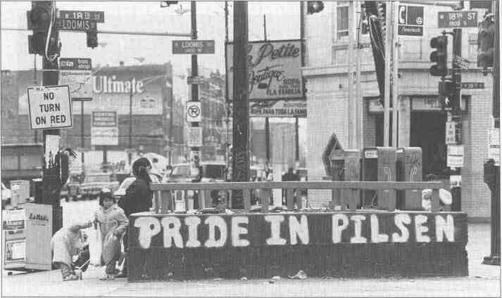 As the Latino population has skyrocekted in Chicago neighborhoods like Pilsen, residents have tried to keep gang graffiti to a minimum.  Brightlyy painted murals and signs are a common sight in these communities, often adorning storefronts and residences.