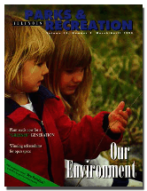 Two young girls learn about nature found in their own backyards at
the Schaumburg Park Districts "Backyards for Nature Fair," a family
event held at Spring Valley Nature Center each year near Earth Day.