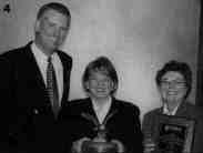 4. Rep. Andrea Moore (center, with Lake County Forest
Preserves executive director Steven Messerli and president Carol
Calabresa).)