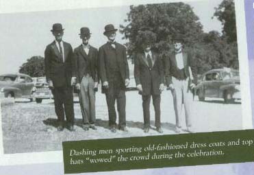Dashing men sporting old-fashioned dress coats and top hats "wowed" the crowd during the celebration